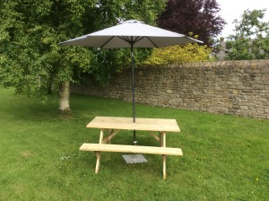 Parasol and picnic bench