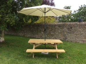 Picnic bench with umbrella