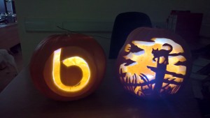 John Bright b and cat scene carved in pumpkin