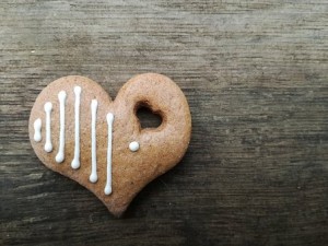 Gingerbread heart decorated with icing stripes