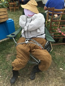 Scarecrow in padlocks