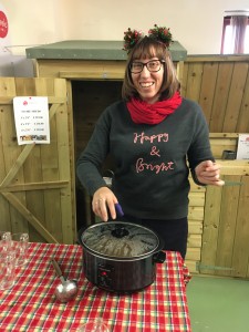 Beth Bright serving mulled apple juice