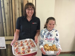 woman and child with cake trays