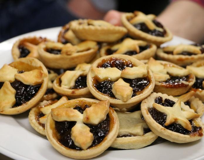 Mince pies with holly pastry decoration