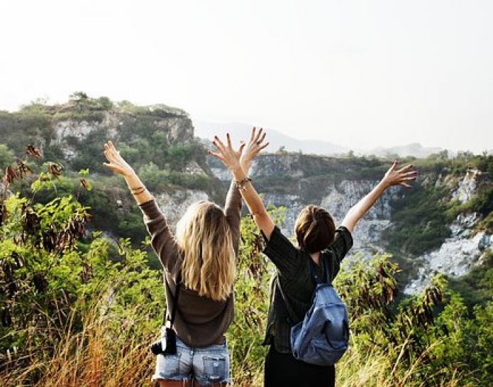 Women with backpacks on holiday
