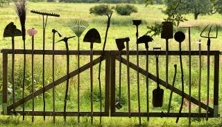 Metal gate made from gardening tools