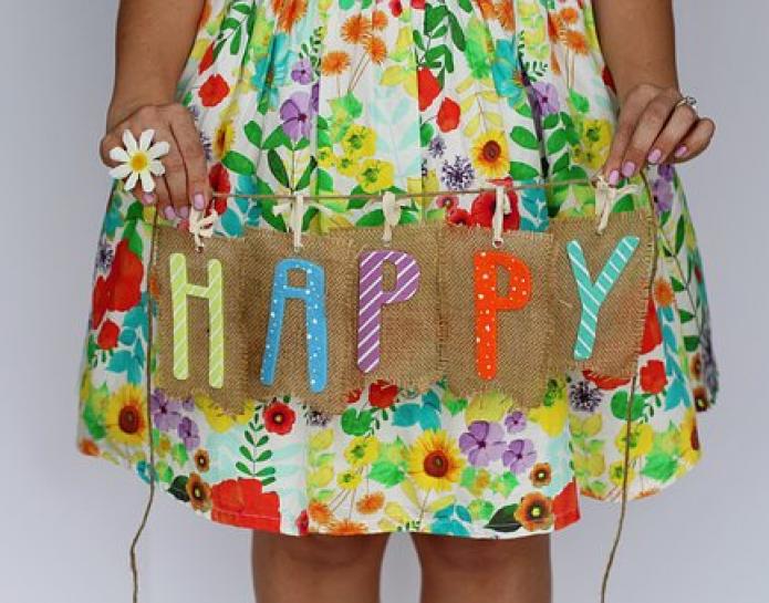 Girl with happy sign