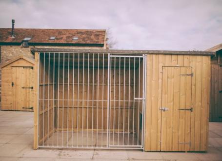 Dog House and Covered Run. Dog kennels and runs from John Bright Fencing. Galvanised dog run.